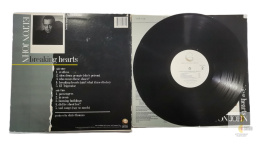 Elton John - Breaking hearts